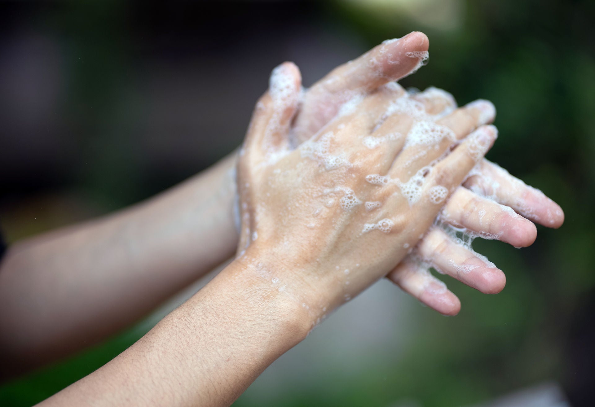 young woman person hand hygiene cleaning with wipe cleaner, body health concept