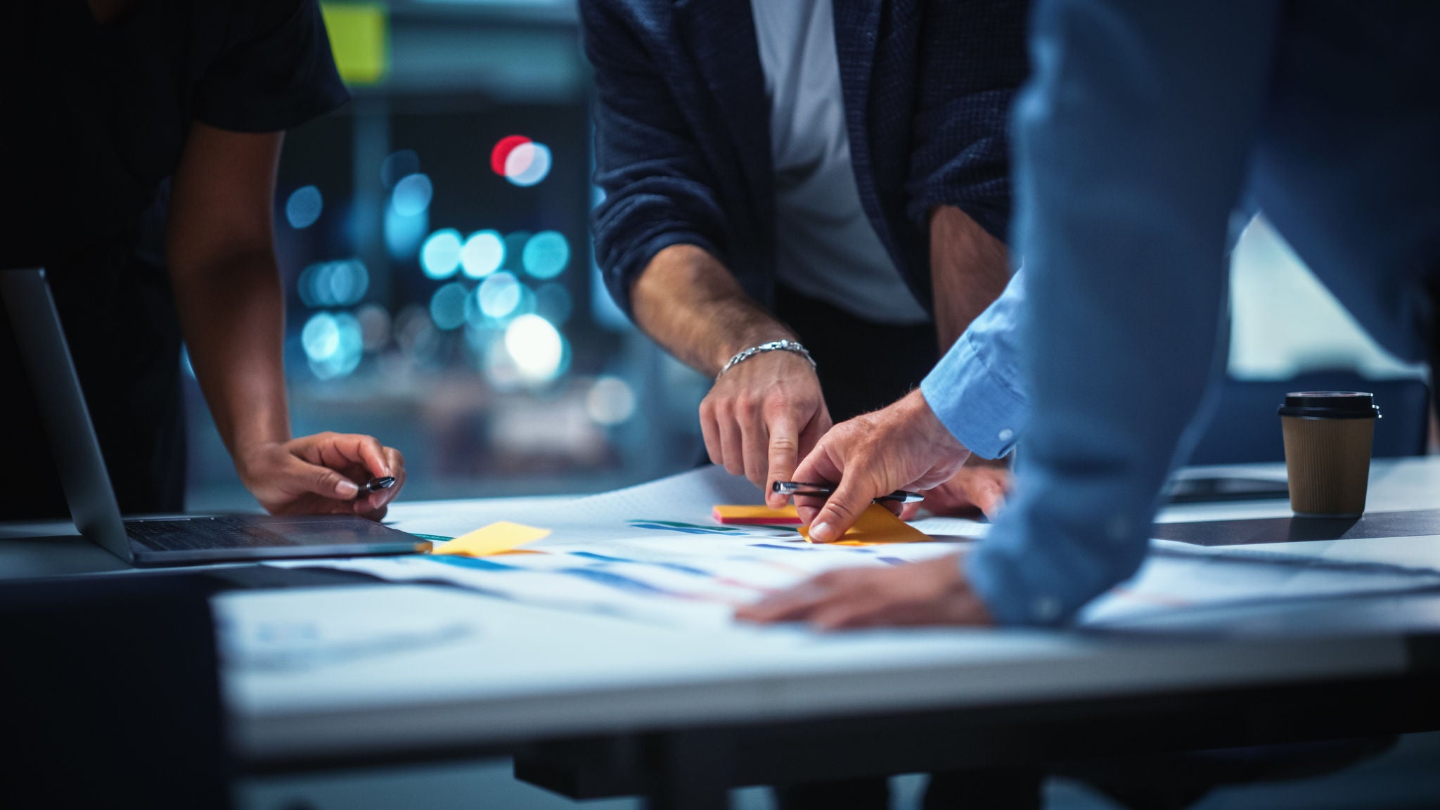 Office Conference Room Meeting: Diverse Team of Top Managers Talk, Brainstorm, Use Digital Tablet. Business Partners Discuss Financial Reports, Plan Investment Strategy. Team of Three